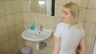 Cute blond is fucked in the toilet next to a cuckold bf